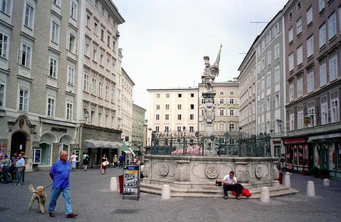 Nuns and Nazis Walking Tour in Salzburg - Mirabell Gardens and Makartplatz: movie images with a darker backdrop