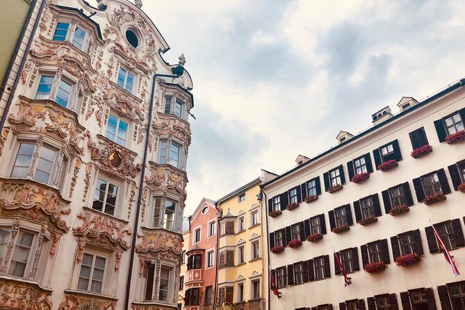 Self-Guided 1,5-hour Tour of Innsbruck: Exciting Stories, Photo Spots & Desserts - Swarovski and the modern Maria-Theresien-Strasse