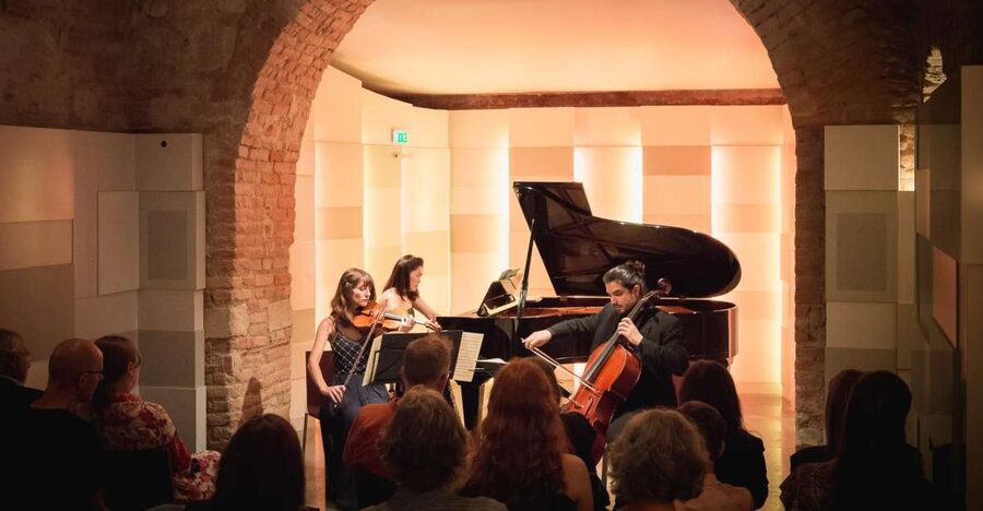 Vienna: Classical Concert at Mozarthaus with Museum Entry - The descent to the candlelit cellar