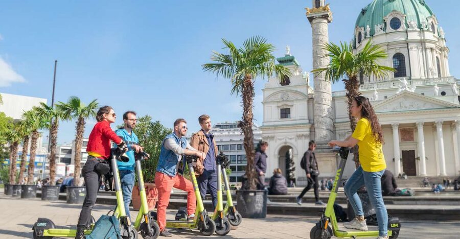 Vienna: Guided Tour by Kick Bike or E-Scooter with a Local - Quiet squares and traditional Beisl neighborhoods