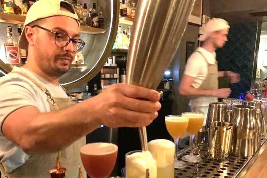 Vienna Nightlife: Food, Wine, Cocktails and Rooftop Bar Tour - Starting at Karlskirche as Vienna changes color