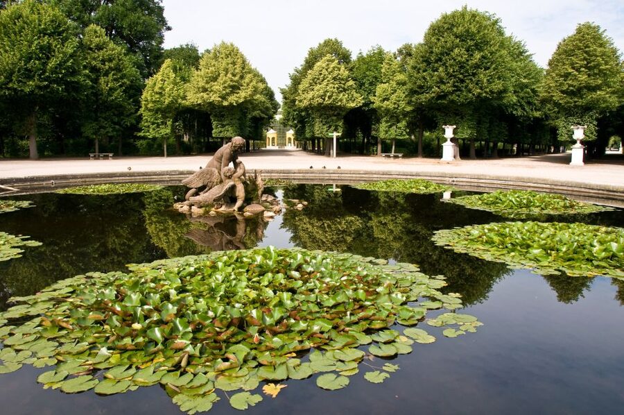 Vienna: Skip-the-Line Schonbrunn Palace Private Tour - Walking the formal gardens toward the Gloriette